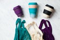 Various fashion colours of net bags and reusable coffee cups