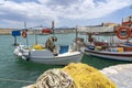 The various fishing boats have delivered their catch to the restaurants in the harbor of the old town in Rethimno, Crete, Greece