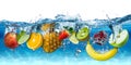 Various fresh colorful tasty fruits splashing into cold water isolated on blue white background. food diet healthy eating Royalty Free Stock Photo