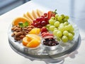 various fresh fruits in plate on white marble table. served with elegance