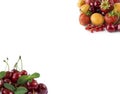 Various fresh summer berries. Ripe strawberries, redcurrants, apricots, nectarines and cherries on white background.