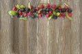 Various fresh summer berries on wooden background Royalty Free Stock Photo