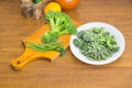 Different frozen and fresh green vegetables on a cooking table Royalty Free Stock Photo