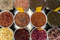 Various fruit teas on the counter in the market.