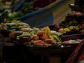 Various fruits and vegetables on display in typical indoor market Mercado 10 de Agosto in Cuenca Ecuador South America