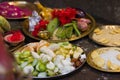 Various fruits, vegetables and sweets are kept together in brass plates for performing puja rituals in hindu festivals of Durga Royalty Free Stock Photo