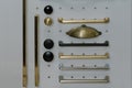 Various furniture handles in a showcase. Kitchen accessories. View from above