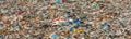 Various garbage on landfill site baner no logos / trademarks visible on dump stuff Royalty Free Stock Photo