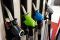 Various gasoline petrol pumps on a gas station. Fuel nozzles oil dispensers. Petrol gas diesel fuel prices concept Royalty Free Stock Photo