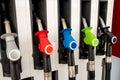 Various gasoline petrol pumps on a gas station. Fuel nozzles oil dispensers. Petrol gas diesel fuel prices concept Royalty Free Stock Photo