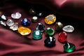 various gemstones on a black velvet fabric