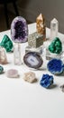 Various gemstones and crystals displayed on a white surface. Notable pieces include Royalty Free Stock Photo