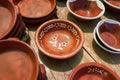 Various glazed dishes in market in Tavira, Portugal