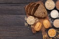 Various Gluten free bread and and grains on wood