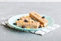 Various granola bars on table background. Cereal granola bars. Superfood breakfast bars with oats, nuts and berries Royalty Free Stock Photo