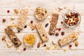 Various granola bars on table background. Cereal granola bars. Superfood breakfast bars with oats, nuts and berries Royalty Free Stock Photo