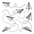 Various hand drawn paper planes. Black doodle airplanes with dotted route line. Aircraft icon, simple monochrome plane Royalty Free Stock Photo