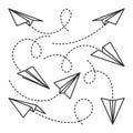 Various hand drawn paper planes. Black doodle airplanes with dotted route line. Aircraft icon, simple monochrome plane Royalty Free Stock Photo