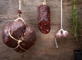 Various hanging salami sausages