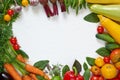 Various healthy vegetarian food background with copy space. Frame of organic raw vegetables, herbs and spices on the white table Royalty Free Stock Photo