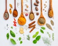 Various herbs and spices in wooden spoons. Flat lay of spices in