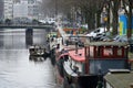 Houseboats in canal of Amsterdam. Netherlands. Royalty Free Stock Photo