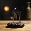 Various incense sticks on a stand burn with smoke, aroma in the house