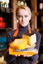 Various italian hard cheese in shop assistant hands Royalty Free Stock Photo