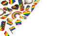 Various items connected with gay pride laying flat on white background. Top view with copy space on the right. 3D rendering