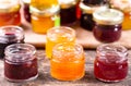 Various jars of fruit jam