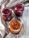 Various jars with homemade fruit jam