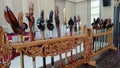Various keris or traditional Indonesian weapons with unique wood carvings are arranged in place of weapons Royalty Free Stock Photo
