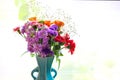 Various kind of flowers in the blue vase Royalty Free Stock Photo