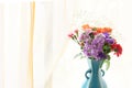 Various kind of flowers in the blue vase Royalty Free Stock Photo