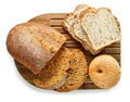 Various kinds of bread on cutting board