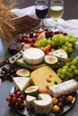 Cheeses wine and fruits display Royalty Free Stock Photo
