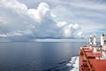 Various kinds of colorful blue sky, white clouds and open spaces of the world ocean. Seascapes. View from the side of a sea ship w Royalty Free Stock Photo