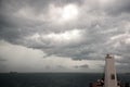 Various kinds of colorful blue sky, white clouds and open spaces of the world ocean. Seascapes. View from the side of a sea ship w Royalty Free Stock Photo