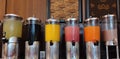 various kinds of juices in the dispenser