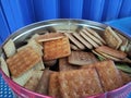 various kinds of pastries in tins