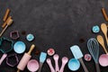 Various kitchen baking utensils. Flat lay. mockup for recipe on dark background.