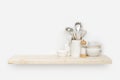 Various kitchen utensils on natural wooden shelf with copy space