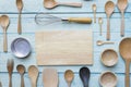 Various kitchen utensils on wooden table background Royalty Free Stock Photo