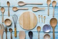 Various kitchen utensils on wooden table background Royalty Free Stock Photo