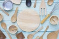 Various kitchen utensils on wooden table background Royalty Free Stock Photo