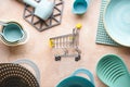 Various kitchen utensils on a yellow background, top view