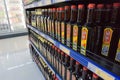 Various labels fish sauce in bottles displayed on shelves in a supermarket, Vietnamese special ingredient for cooking