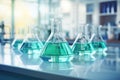 Various laboratory glassware with color liquid and reflection on the table. Science and medicine concept. Generated by Royalty Free Stock Photo