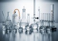 Various laboratory glassware filled with clear liquid is arranged Royalty Free Stock Photo