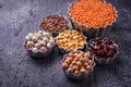 Various legumes. Chickpeas, red lentils, black lentils, yellow p Royalty Free Stock Photo